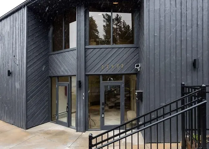 Modern Condo With Town And Mountain Views